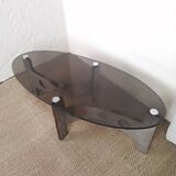 Vintage design coffee table in brushed aluminum and glass top.