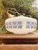 Suspension in opaline milk glass