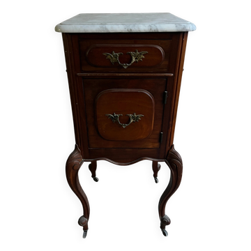 French bedside table in Louis XV style with a marble top.