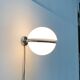 Mid-century Italian space age spherical wall light by Guzzini.