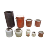 Collection of old sandstone pots with grease and mustard salting
