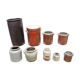 Collection of old sandstone pots with grease and mustard salting