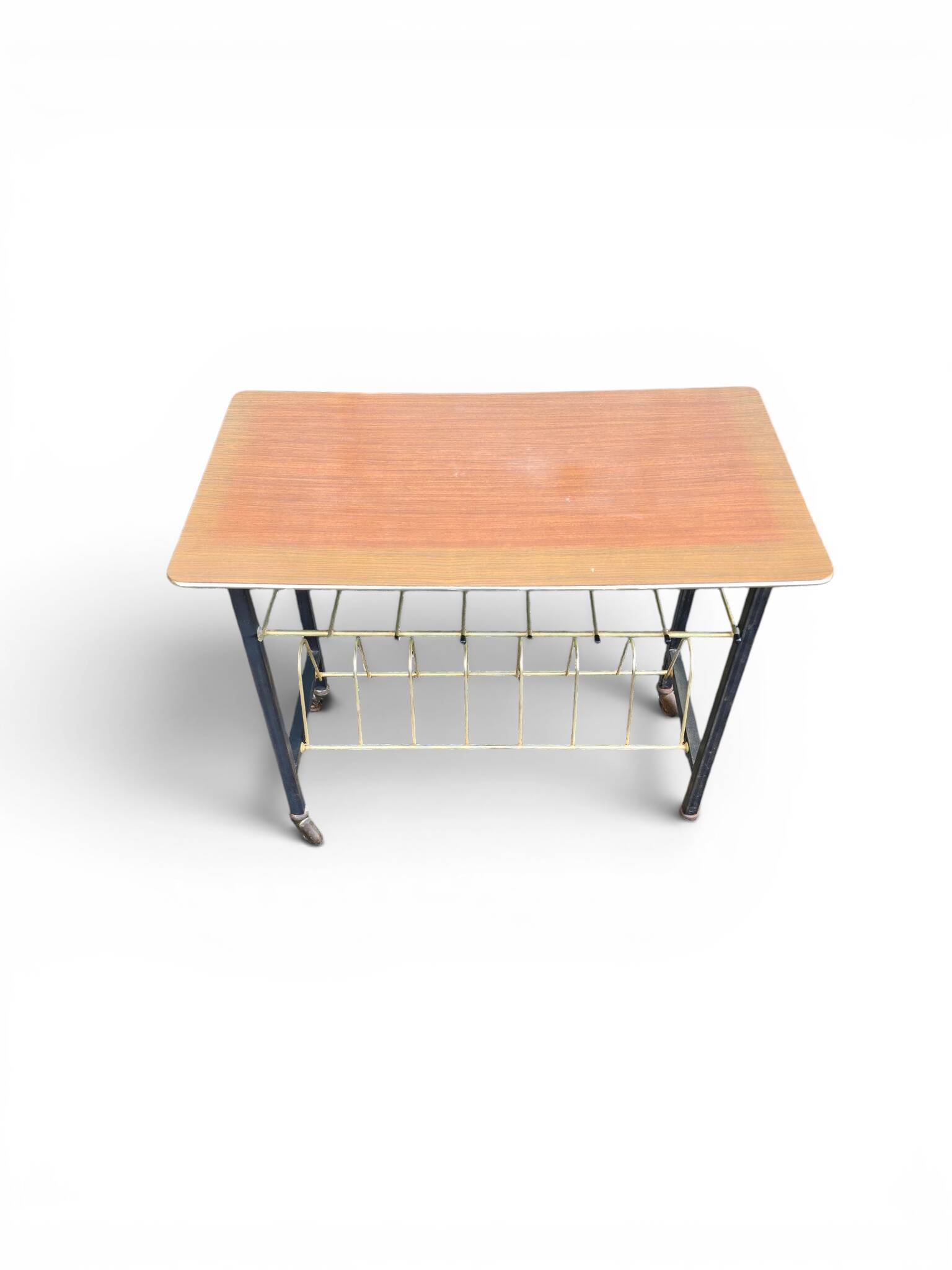 Vintage 1950s magazine table in metal and formica.