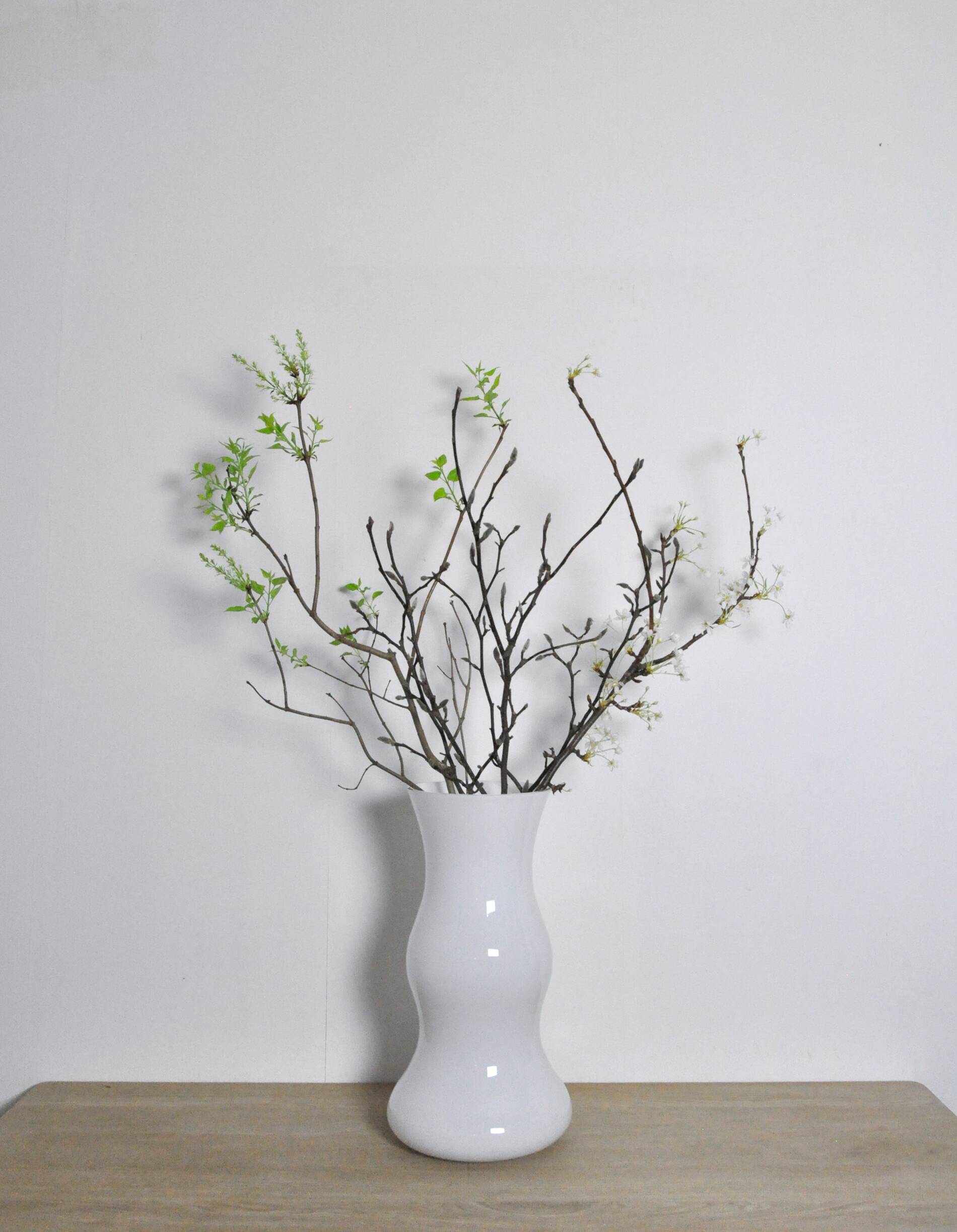 Mouth blown Holmegaard large white glass floor vase by Erik Bagger