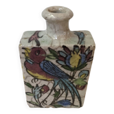 Iznik vase with hand-painted floral decor.