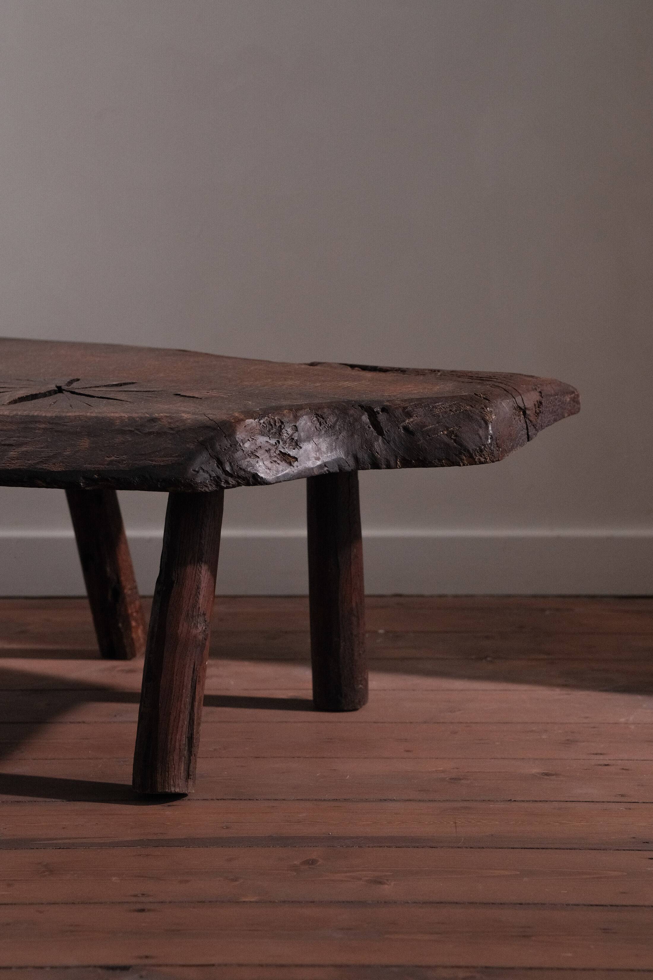 Coffee table in solid wood with organic shape