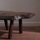 Coffee table in solid wood with organic shape