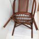 Rattan armchair with its footrest 70s