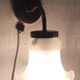 Swan neck wall lights in brass and glass - mid 20th century.
