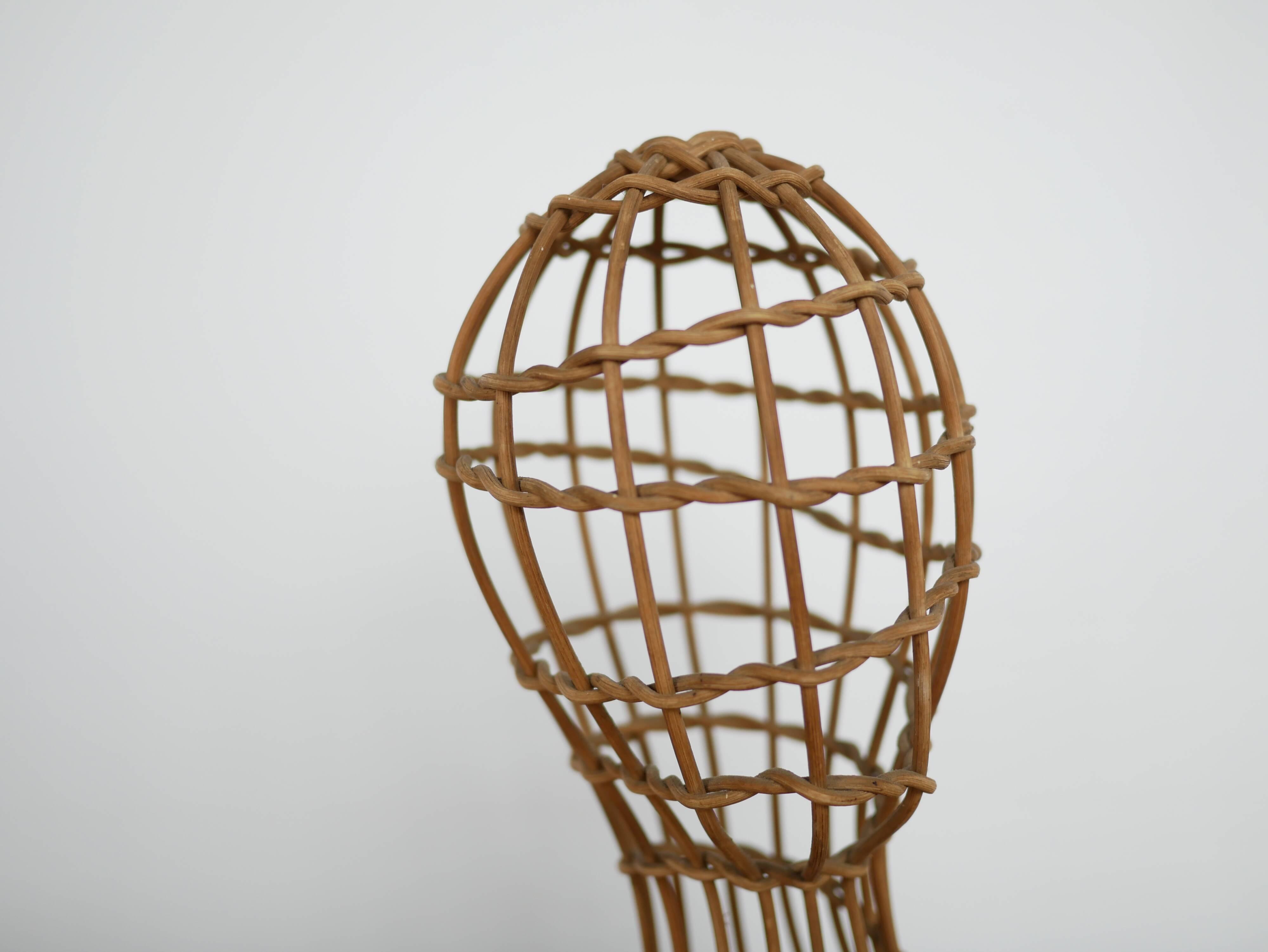 Vintage rattan hat rack