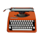 Hermes Baby orange typewriter