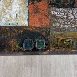 Coffee table in enamelled lava stone