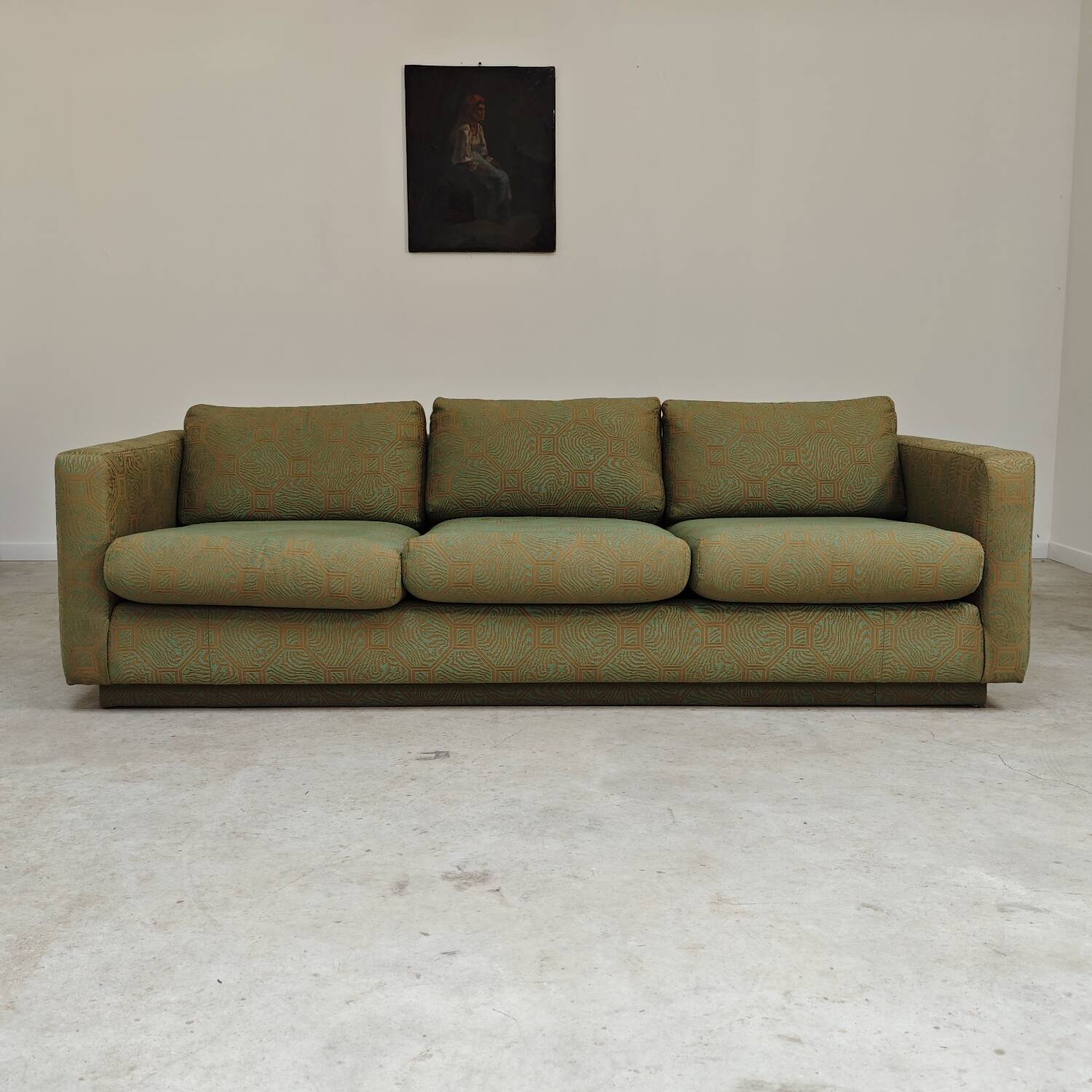 Pierre Frey modernist bench in green and gold patterned fabric
