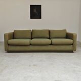 Pierre Frey modernist bench in green and gold patterned fabric