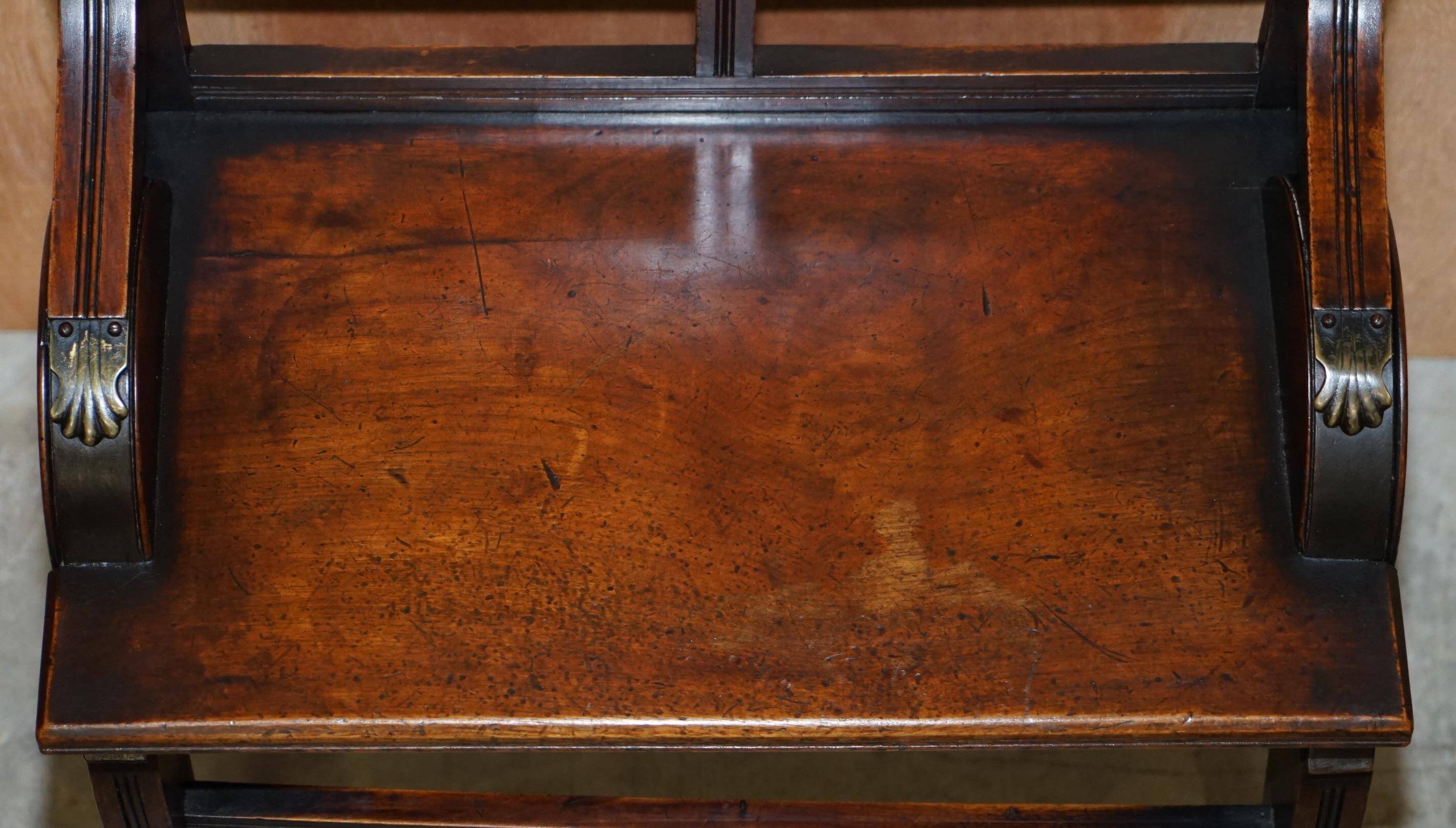 Antique entrance bench by Jas Shoolbred with brass fittings and walnut frame circa 1890.