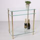Hollywood Regency side table with gold-colored legs
