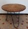 Vintage round rattan and metal coffee table
