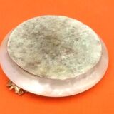 1970s Onyx ashtray with a gold metal rim.