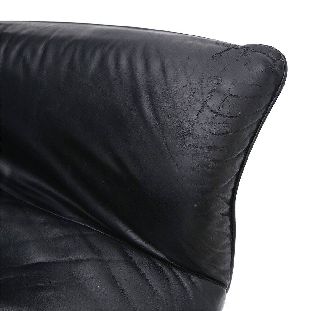 Set of black leather reclining chairs, 1970s.