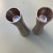 Pair of aluminum candlesticks