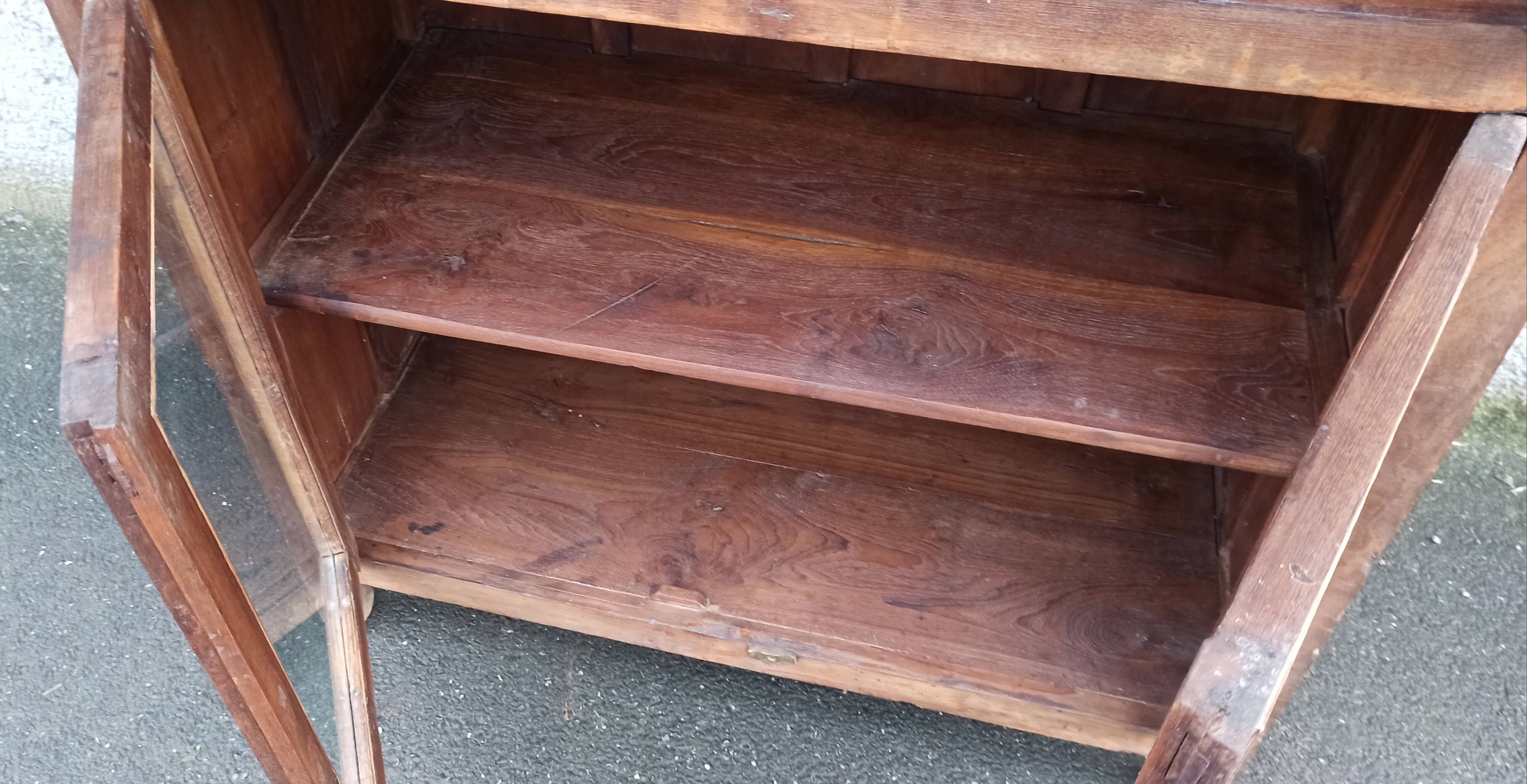 Old wooden glazed cabinet with four doors