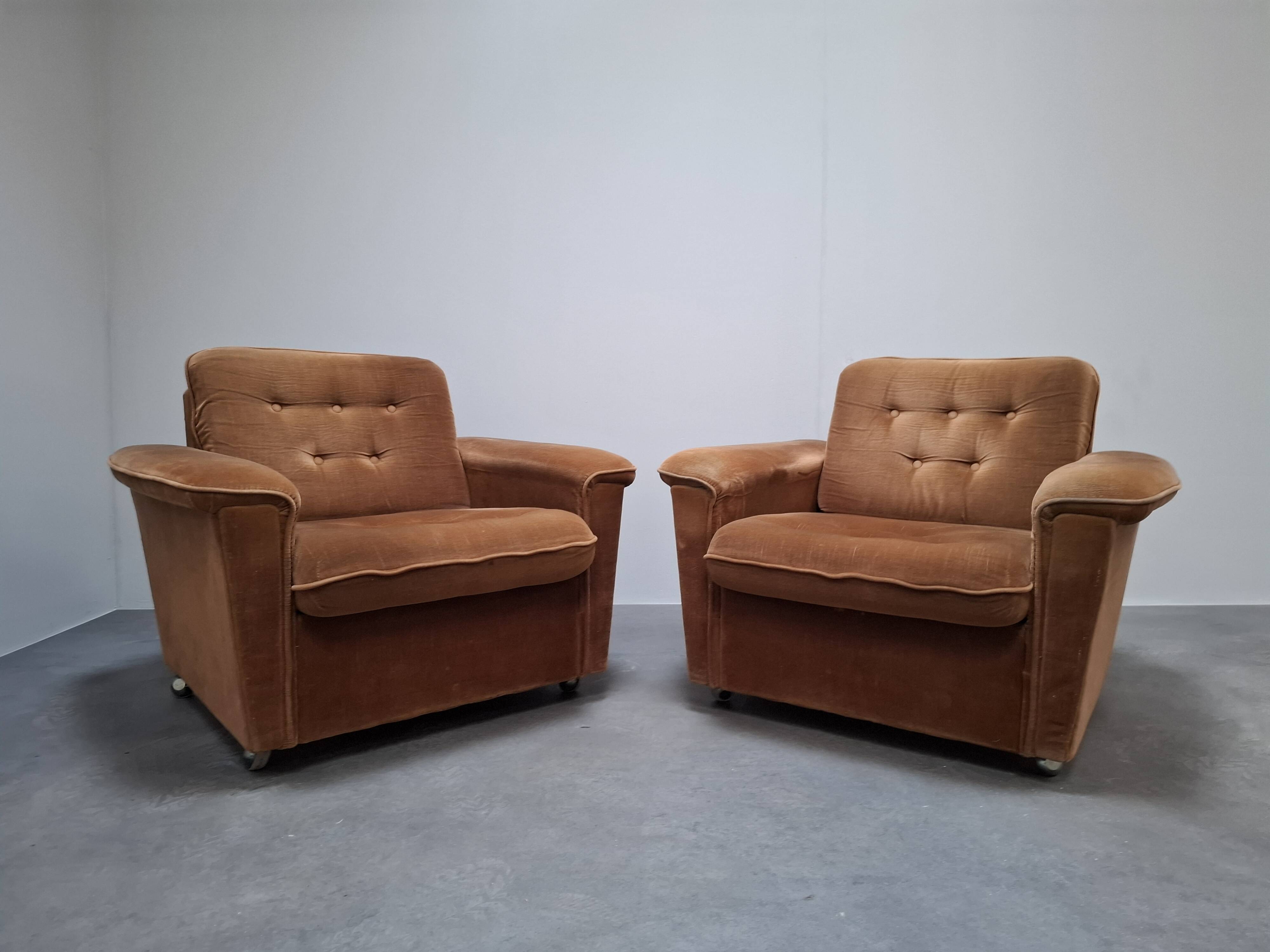 Pair of Mid-Century Modern Czech Lounge Armchairs with Rolling Casters
