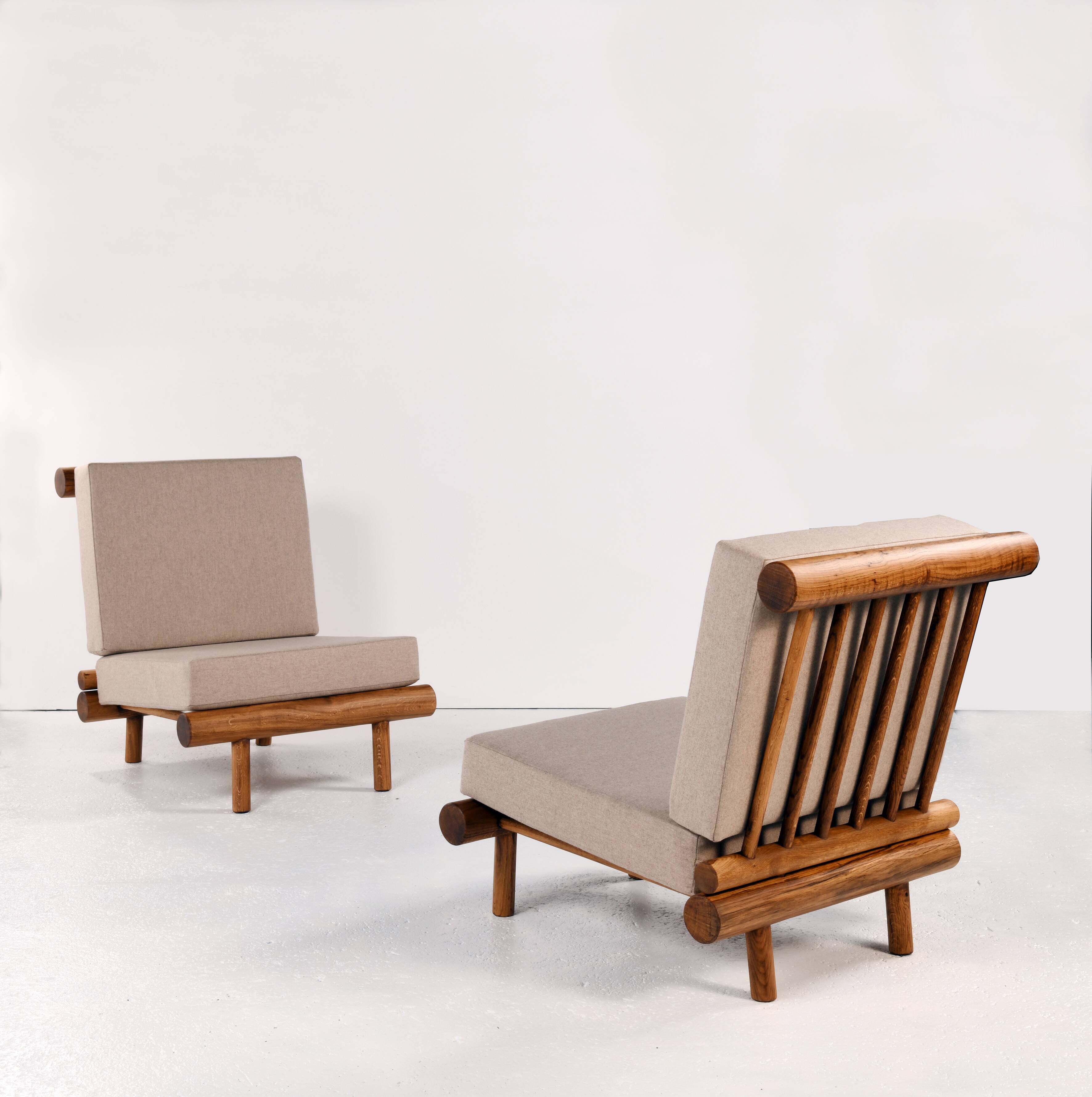 Pair of low chairs called La cachette selected by Charlotte Perriand