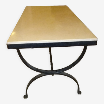 Wrought iron coffee table and beige marble top