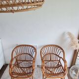 Pair of vintage rattan armchairs circa the 1970s.