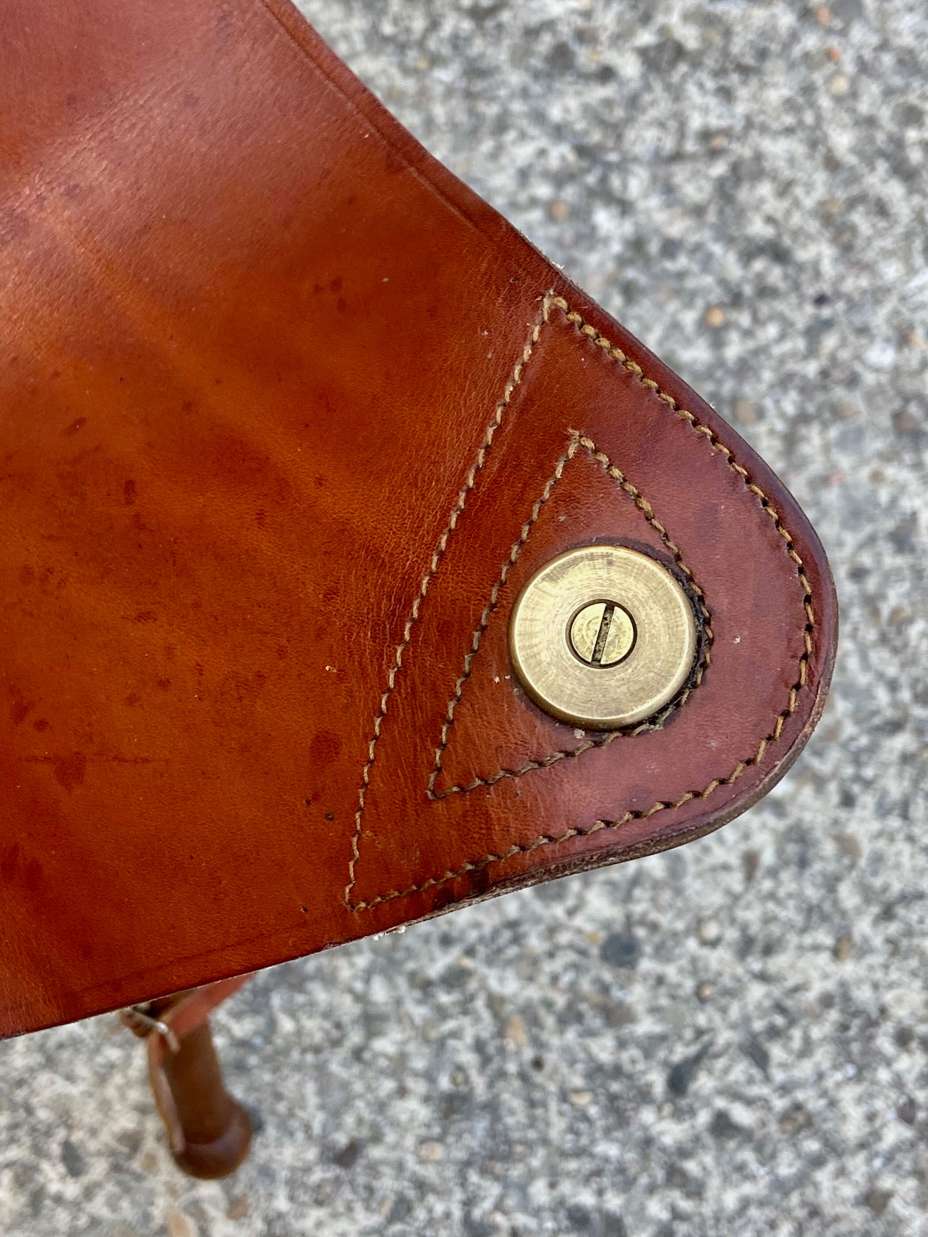 Folding leather tripod stool
