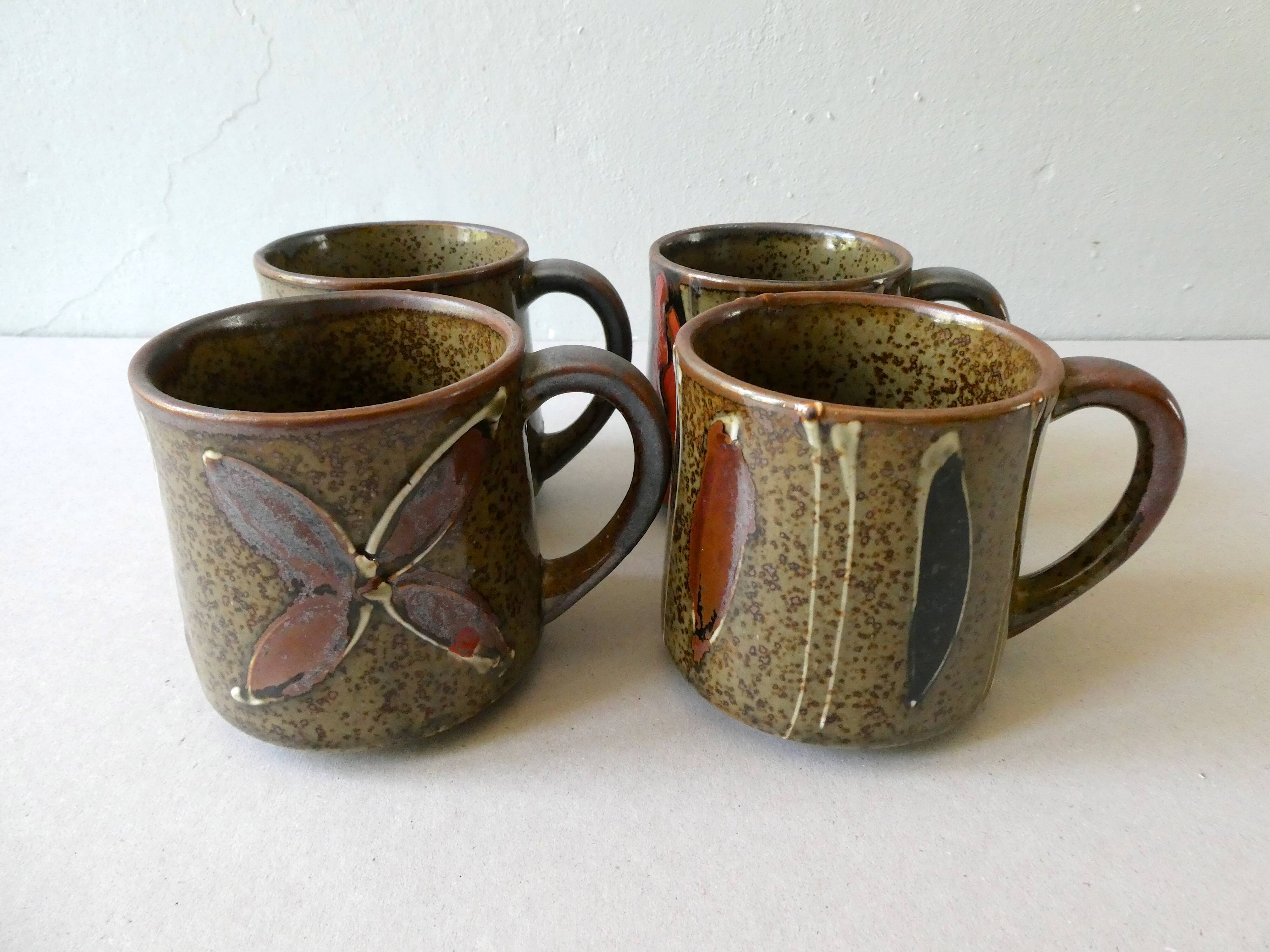Set of 4  sandstone mugs 70 years