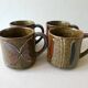 Set of 4  sandstone mugs 70 years