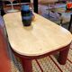 Coffee table Travertine top, garnet-colored metal stand and legs.  Long