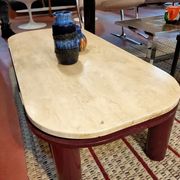 Coffee table Travertine top, garnet-colored metal stand and legs.  Long