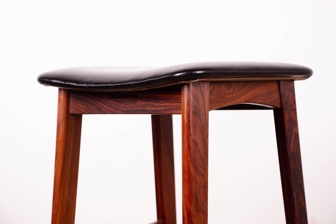 4 Danish high stools, rosewood and black leather, Knud Bent for Dyrlund.
