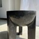 Black mango wood tripod side table with a semi-spherical top, height: 45 cm, diameter: 44 cm.