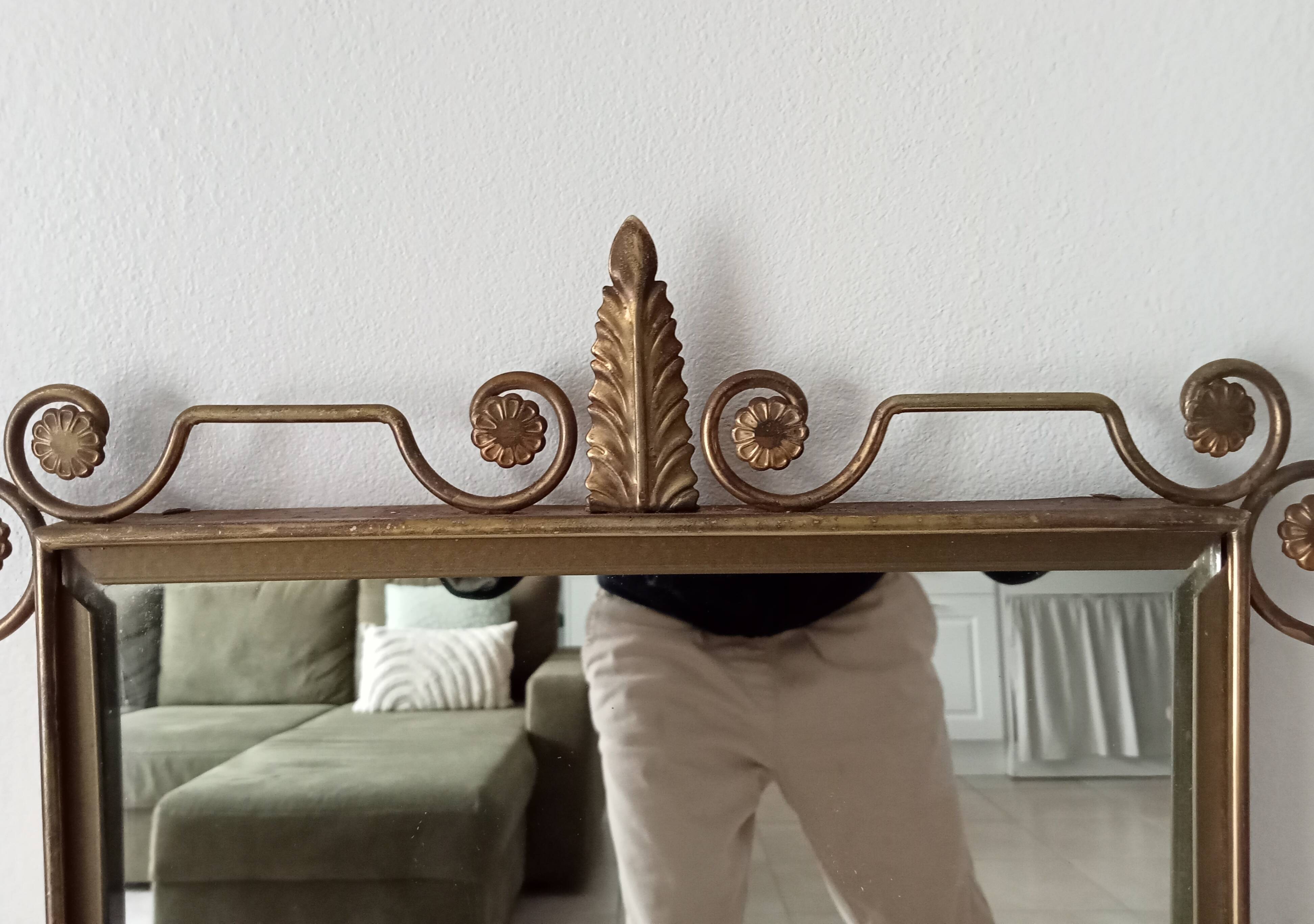 Vintage Hollywood Regency mirror from the 1950s.