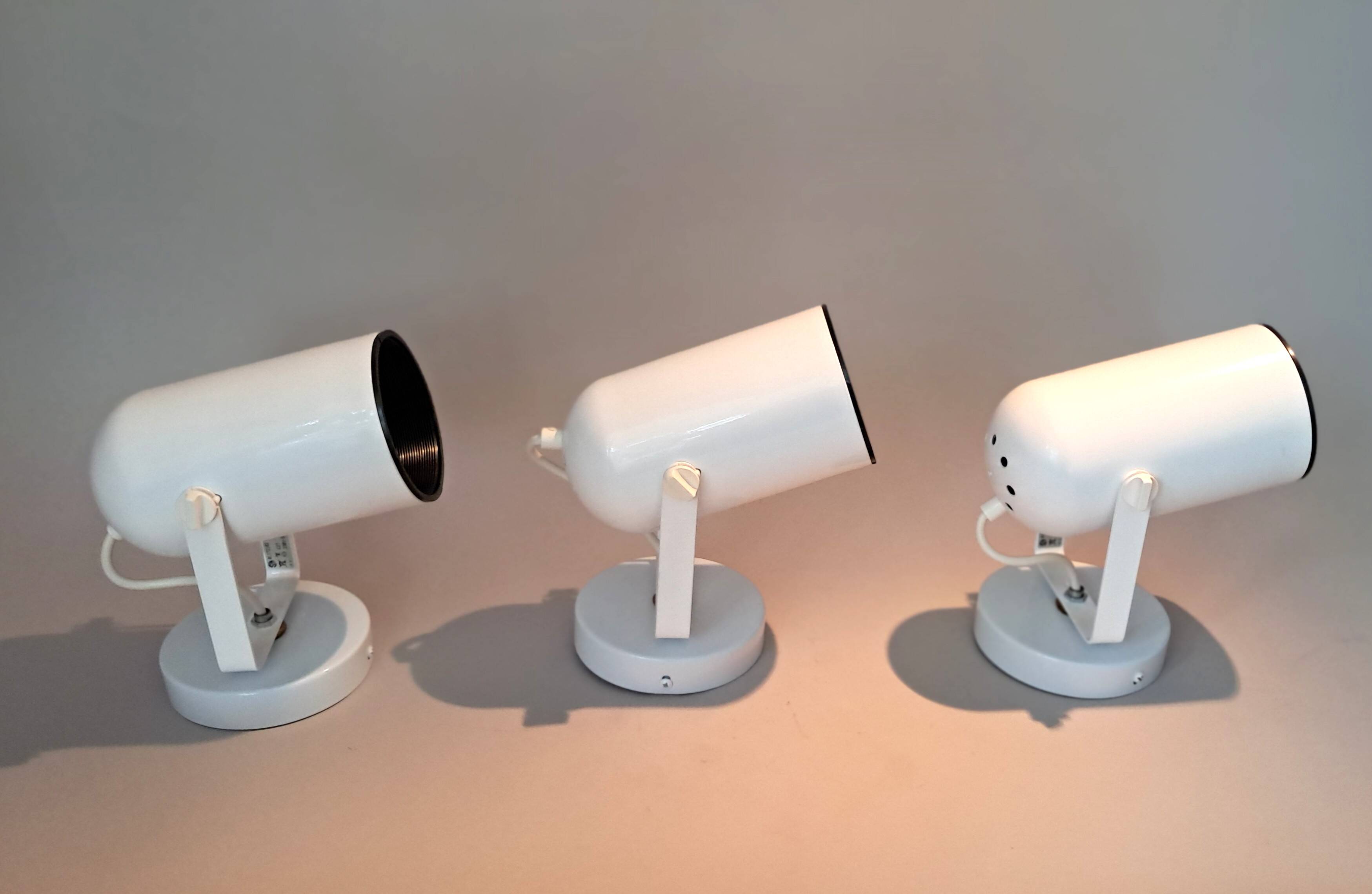 3 white lacquered metal wall lights from the 1970s.