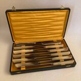 Complete set of 12 stainless steel table knives with Bakelite handles and Art Deco ferrules
