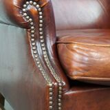 Large comfortable sheepleather wingchair in good condition and beautiful colours