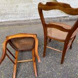 2 Louis Philippe caned chairs from the 19th century in solid wood.