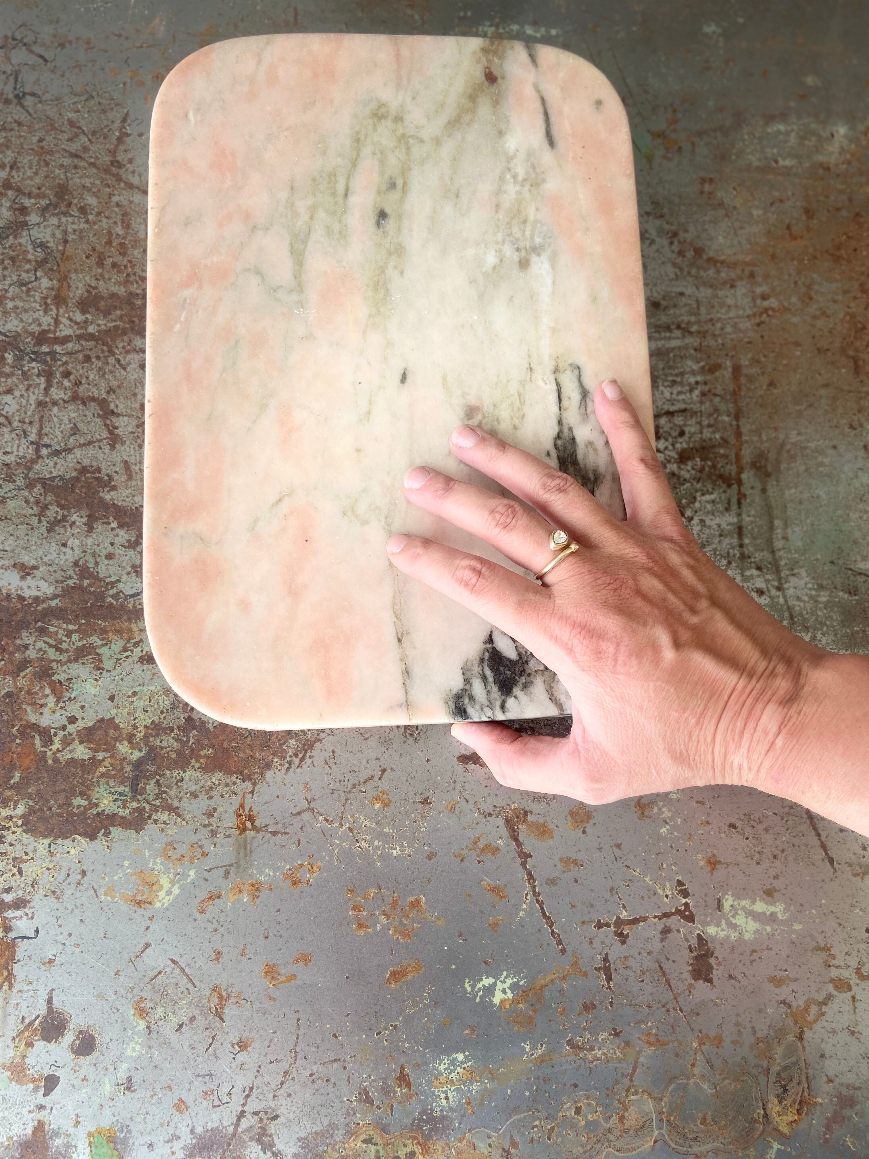 Cutting board in pink natural marble