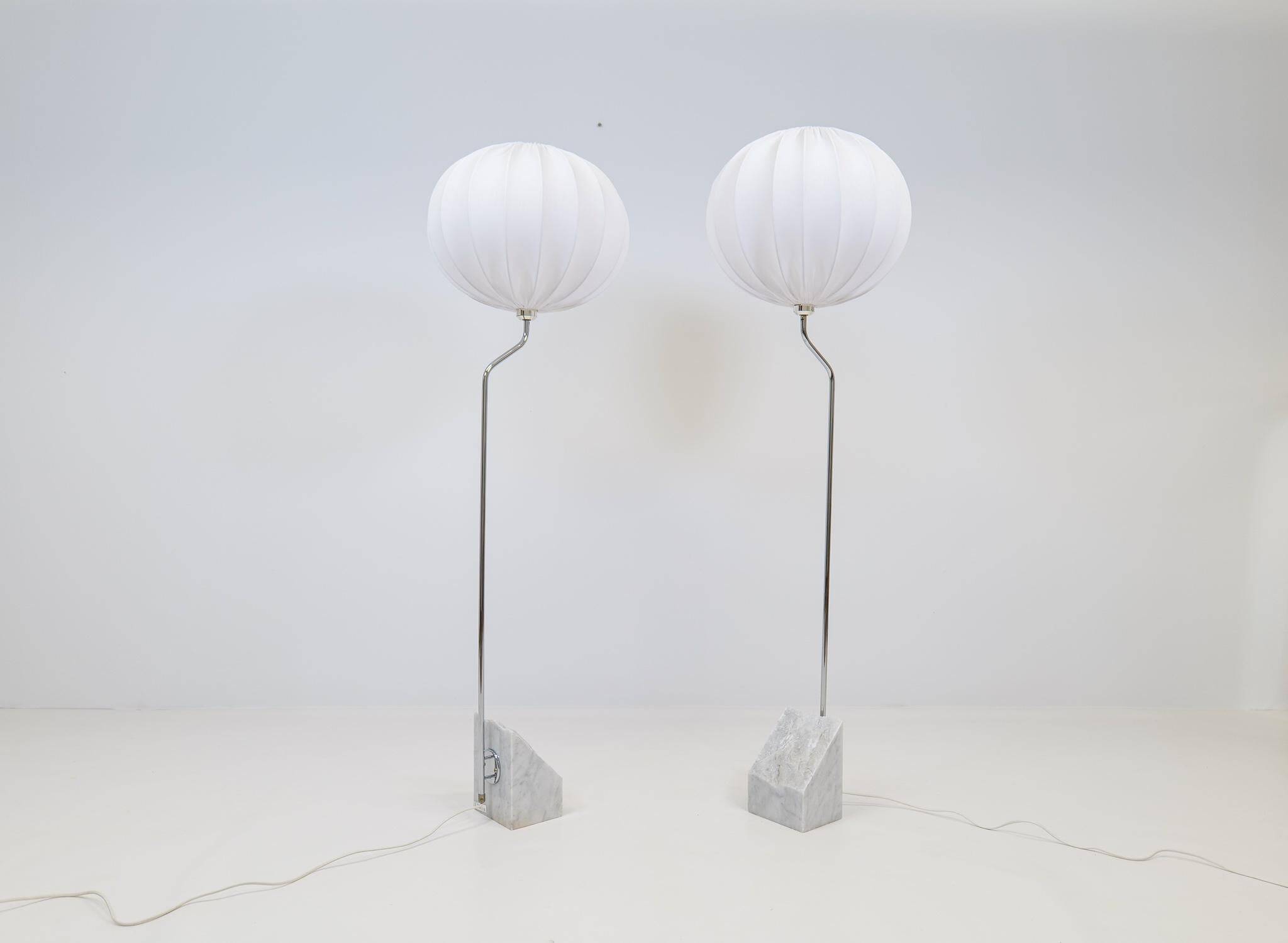 Pair of Bergboms marble and steel floor lamps from the mid-century, 1970s, Sweden.