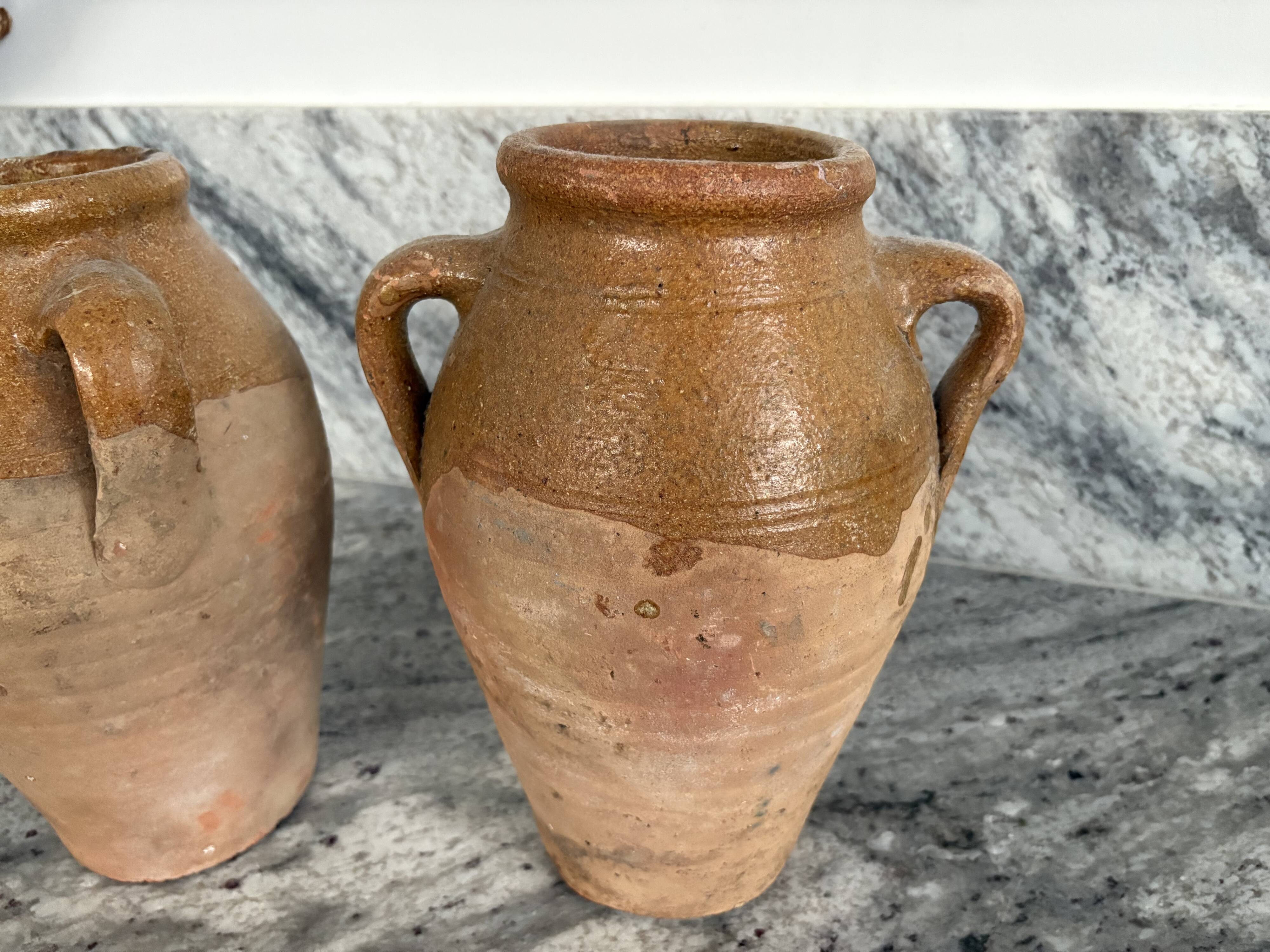 Pair of Provençal enamelled terracotta jars
