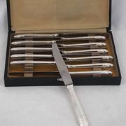 12 dessert, cheese, and hors d'oeuvre knives Grand Prix, Art Deco in silver-plated metal.