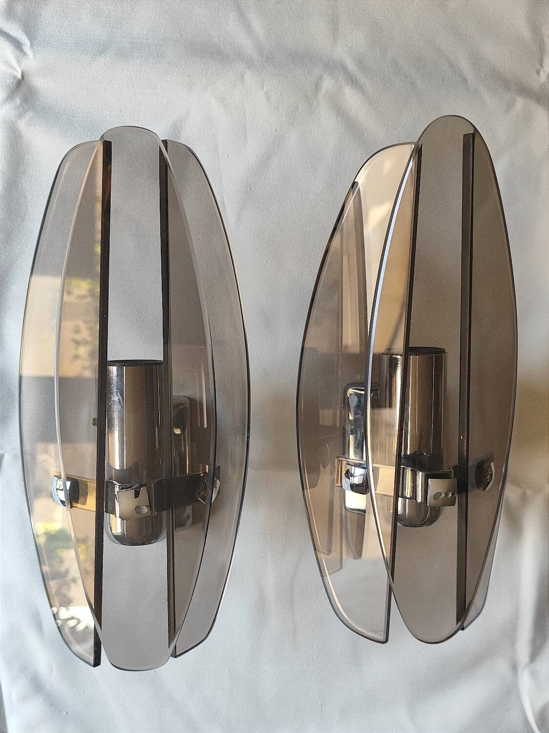 Two vintage smoked glass wall lights