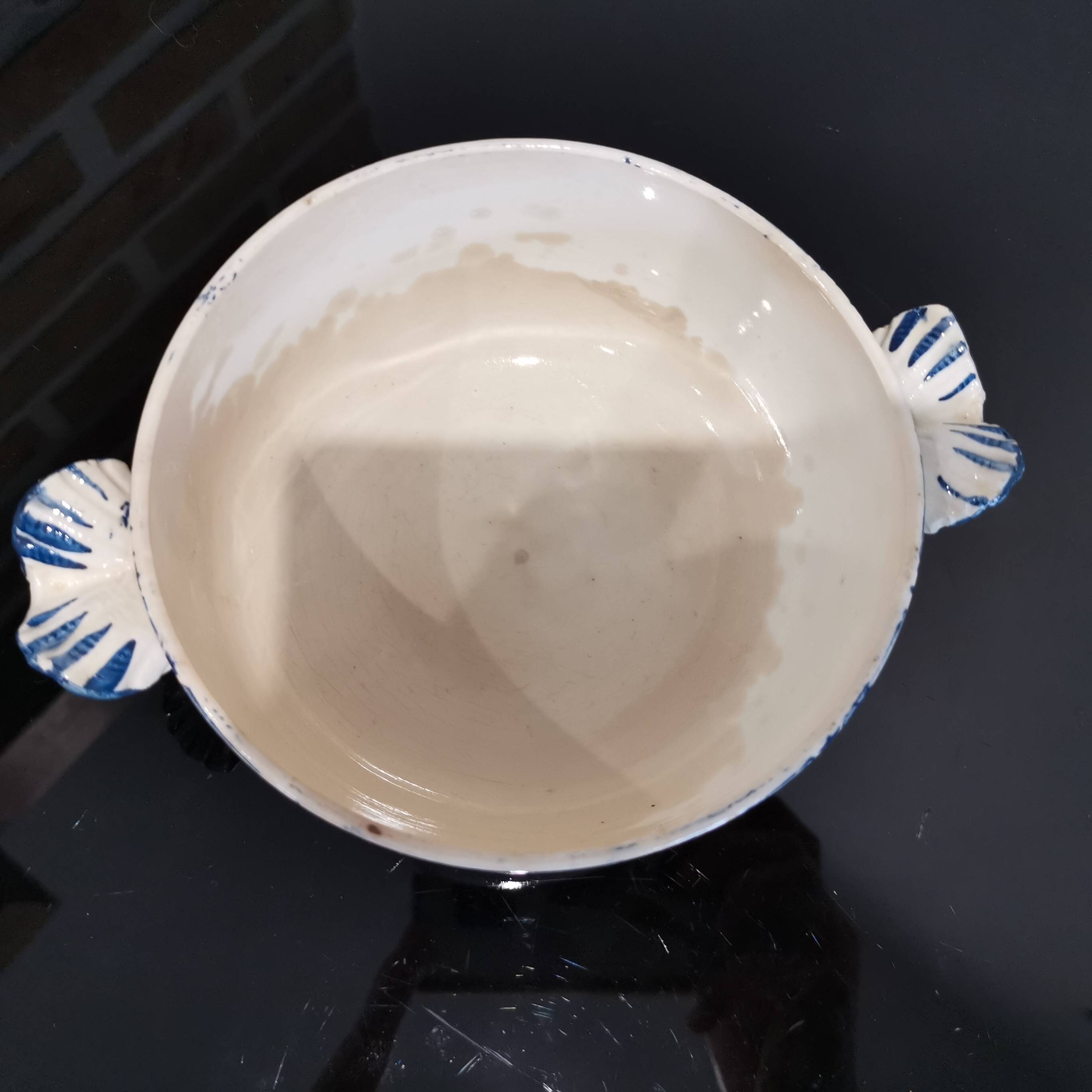 Butterfly ear bowl in iron clay with blue patterns