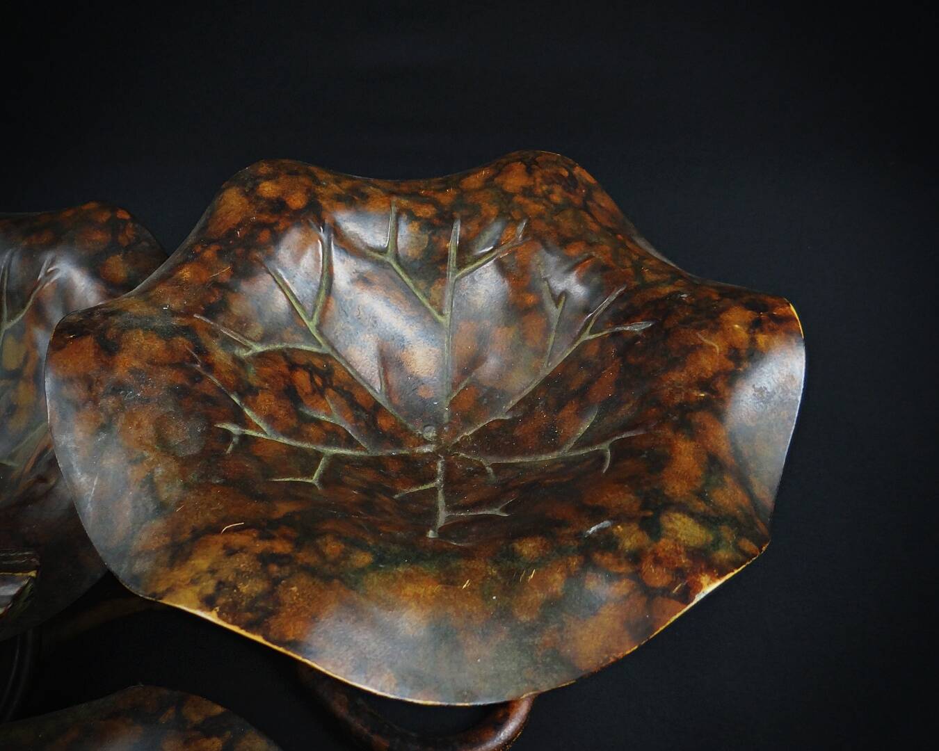 Three-tiered lotus leaf shaped patinated metal bird bath