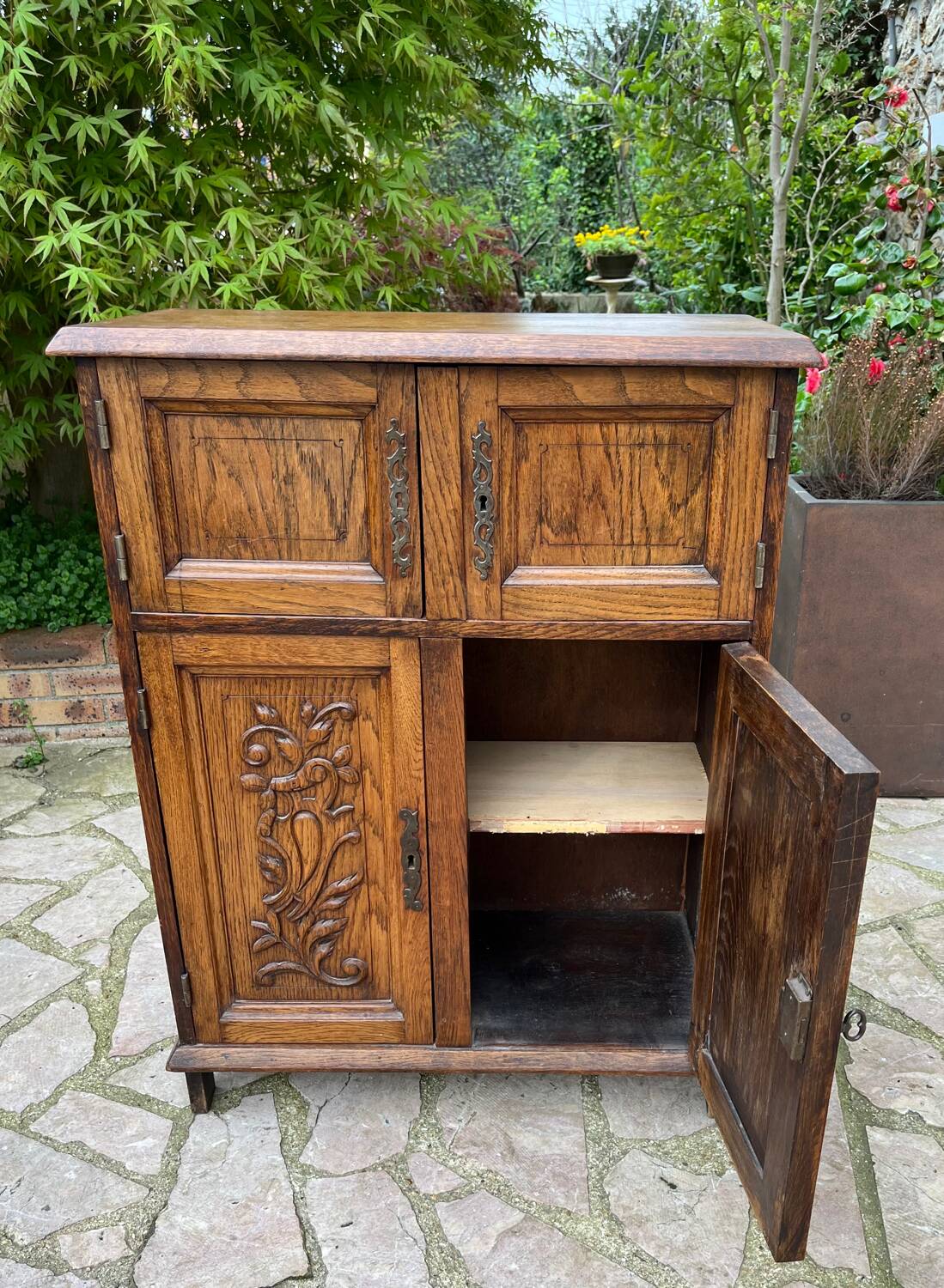 Low carved wooden sideboard