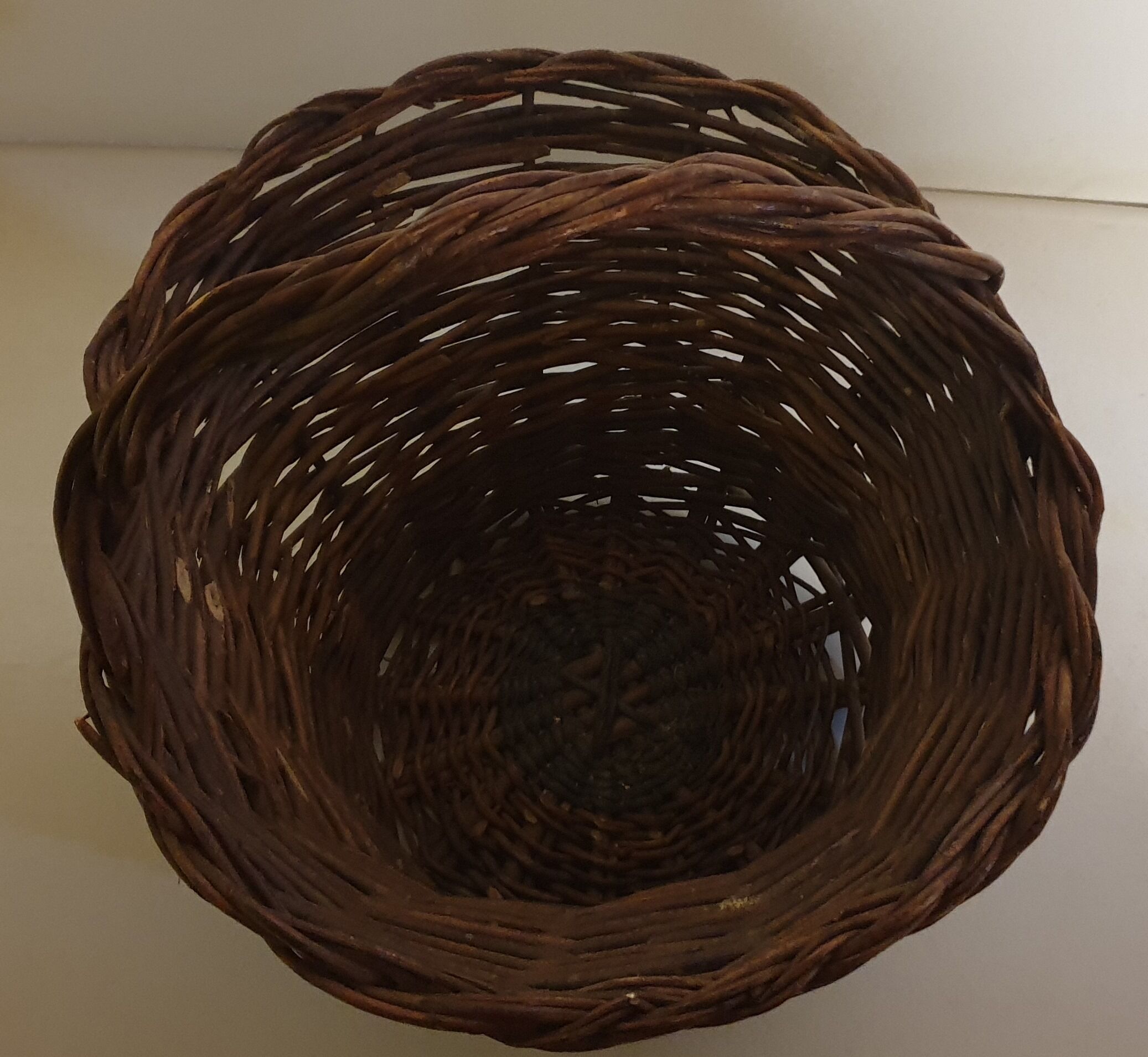Rustic basket made of raw wicker